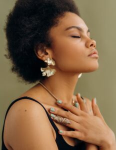 woman hands on chest somatic healing